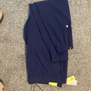 NWT all in motion mens XXL navy run pants. Joggers with zippers. Two pockets.